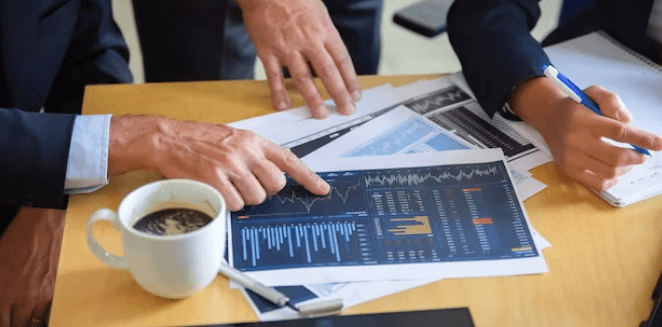 A group translators checking a translated business document in our translation company in Des Moines.