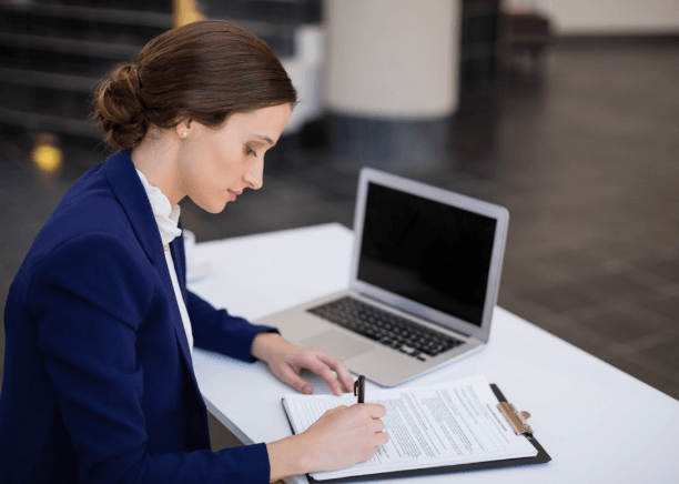 Legal professional using expert legal translation services in Des Moines to assist with contracts and immigration documents.