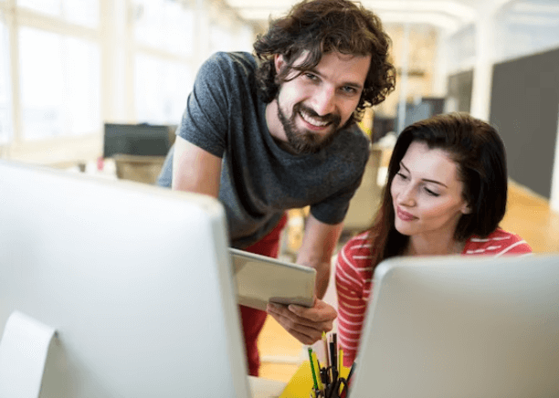 Two native spanish translators working at our translation services in Des Moines.